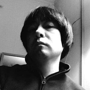 Black and white photo of Independent curator and arts manager, Habu Kazuhito.