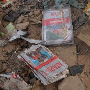 Buried in a landfill are various Atari packaged games.