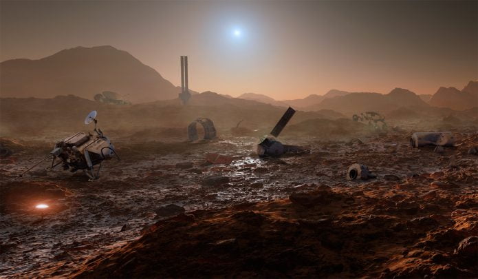 Image of a rocky landscape,possibly the planet Mars,covered in industrial waste.