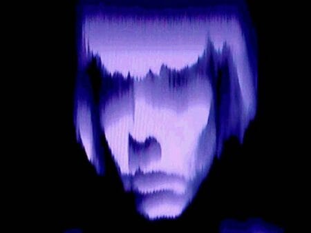 Computer illustration of a persons face, coloured in various shades of purple on a black background.