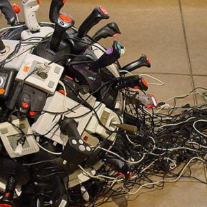 A collection of computer joysticks arranged into a ball.