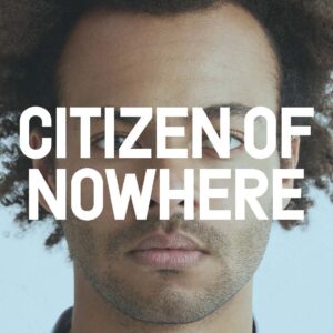 A person looking head on with the words Citizen of Nowhere written in large white writing.