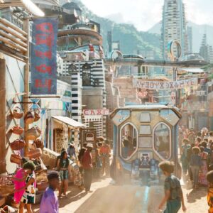 "Wakanda street scene from Black Panther, 2018", A busy African street market with futuristic buildings and a monorail in the background.