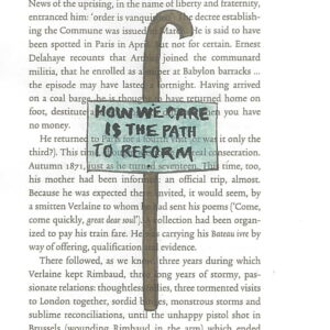 A page of a book. Superimposed over the words of the page is an illustration of a wooden walking stick. On the walking stick is a sign, which reads," How we care is the path to reform".