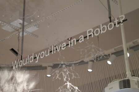 The words ' Would you live in a Robot?' written in white writing.