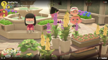 A screen grab from the game " Animal Crossing". Four animated characters are standing in a garden next to a large fountain.