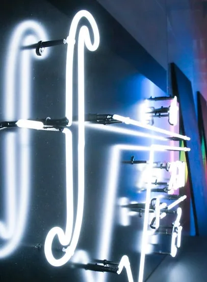 Neon lighting showing a maths formula. 