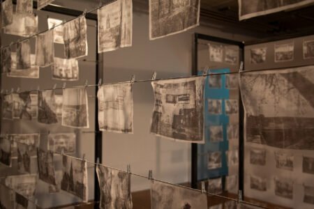 Row upon row of black and white images, printed on very thin sheets of paper.