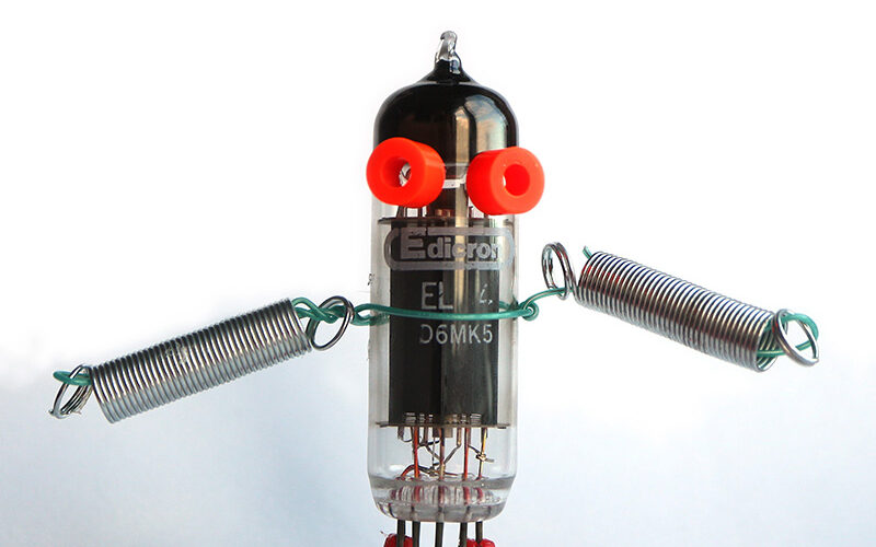 Small robot character made out of e-waste